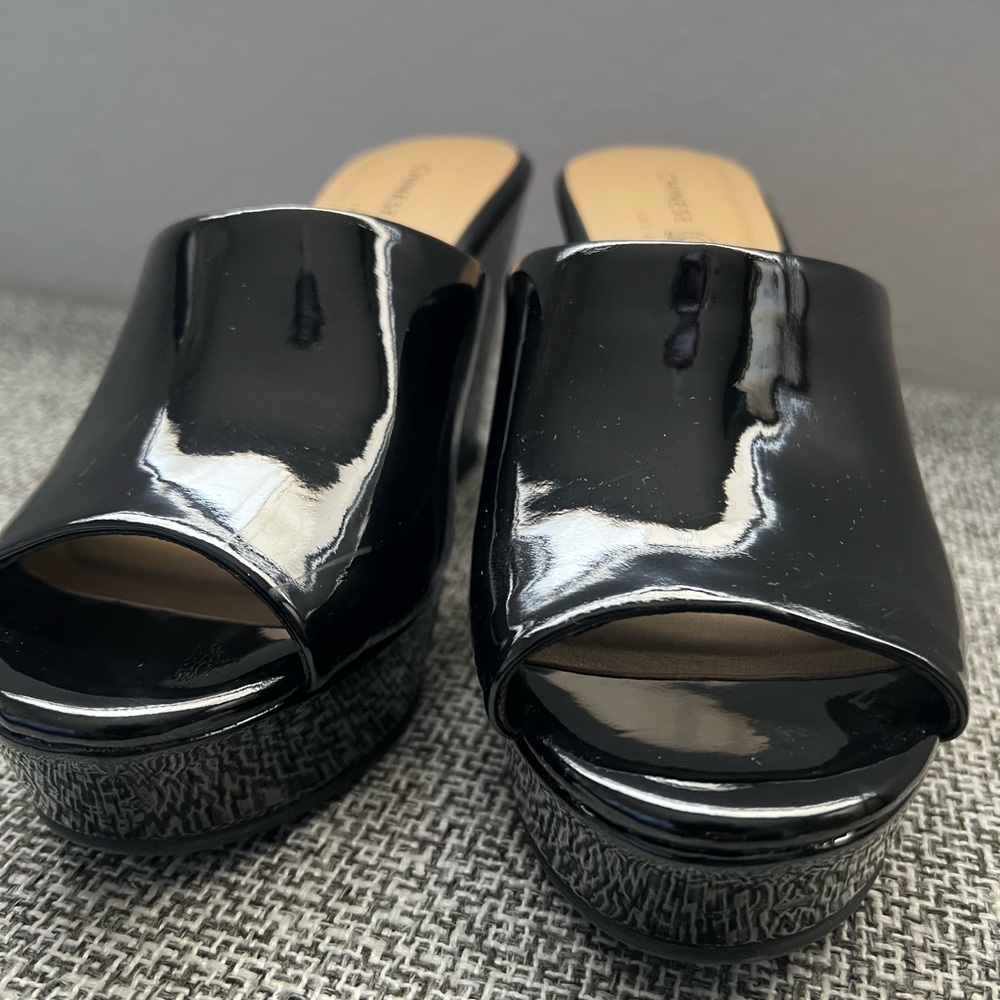 Black Patent Leather Platform Sandals.
Gently used.